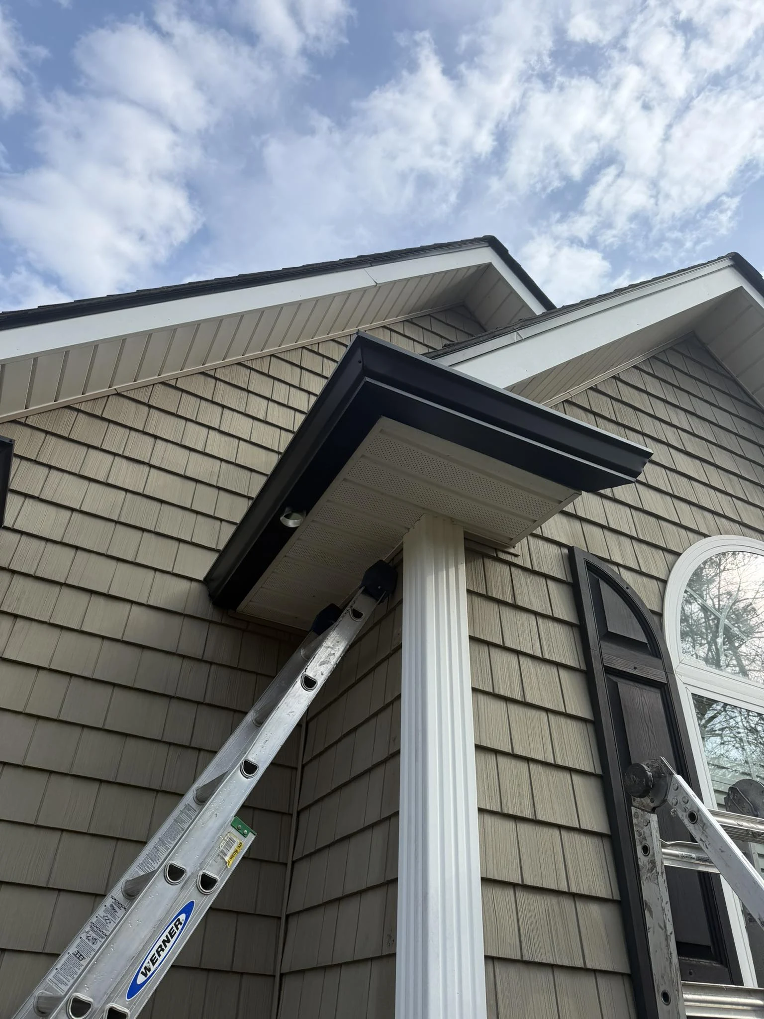 After: new seamless aluminum gutters, color-matched to fascia