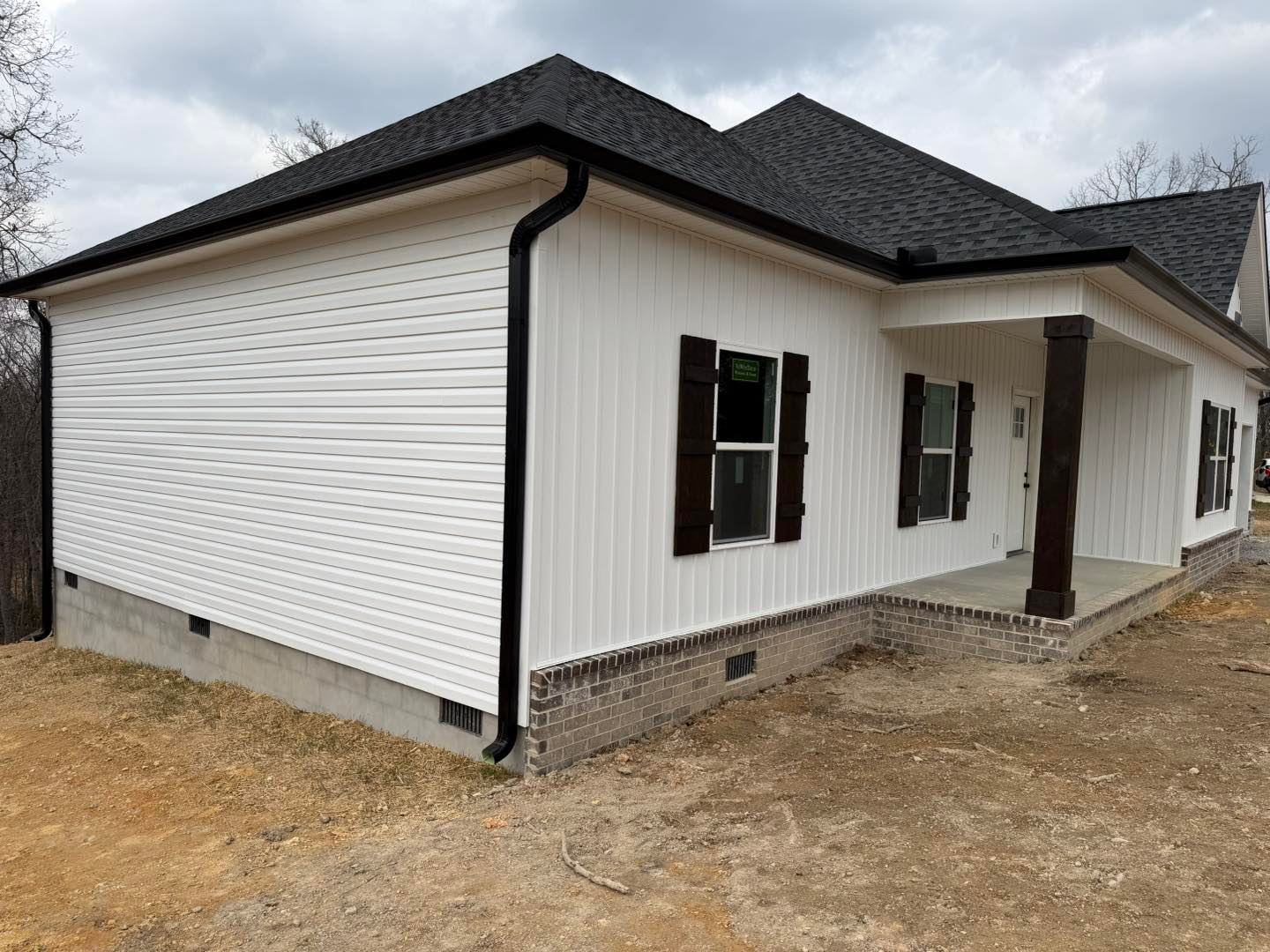 Same home after Premier installed color-matched seamless gutters