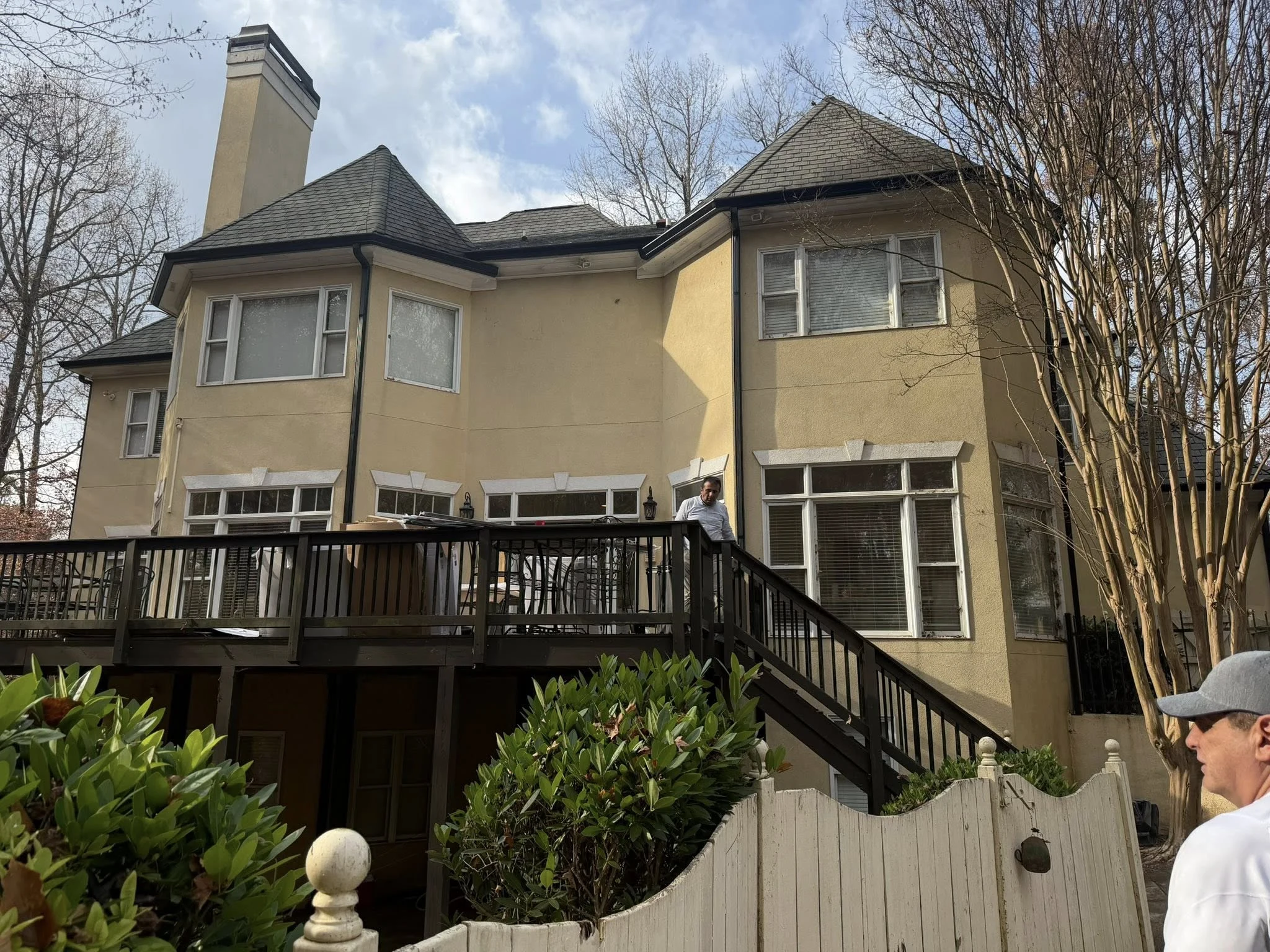 Color-matched downspout against fascia trim